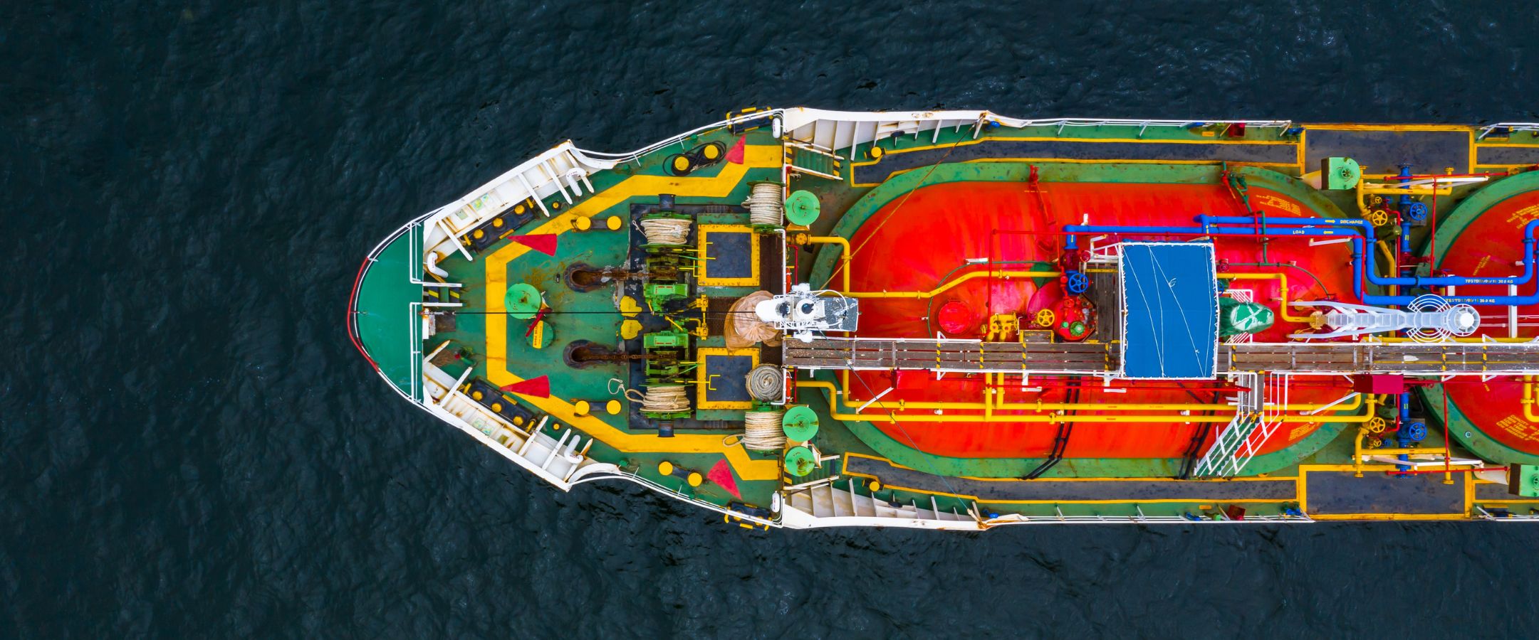 Aerial view of a marine vessel deck at sea